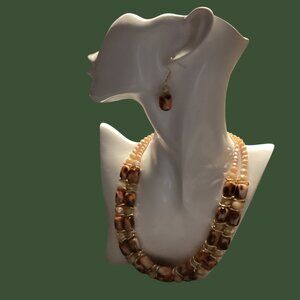 Necklace in multi colored brown stones and rhinestones.  Appropriate for casual